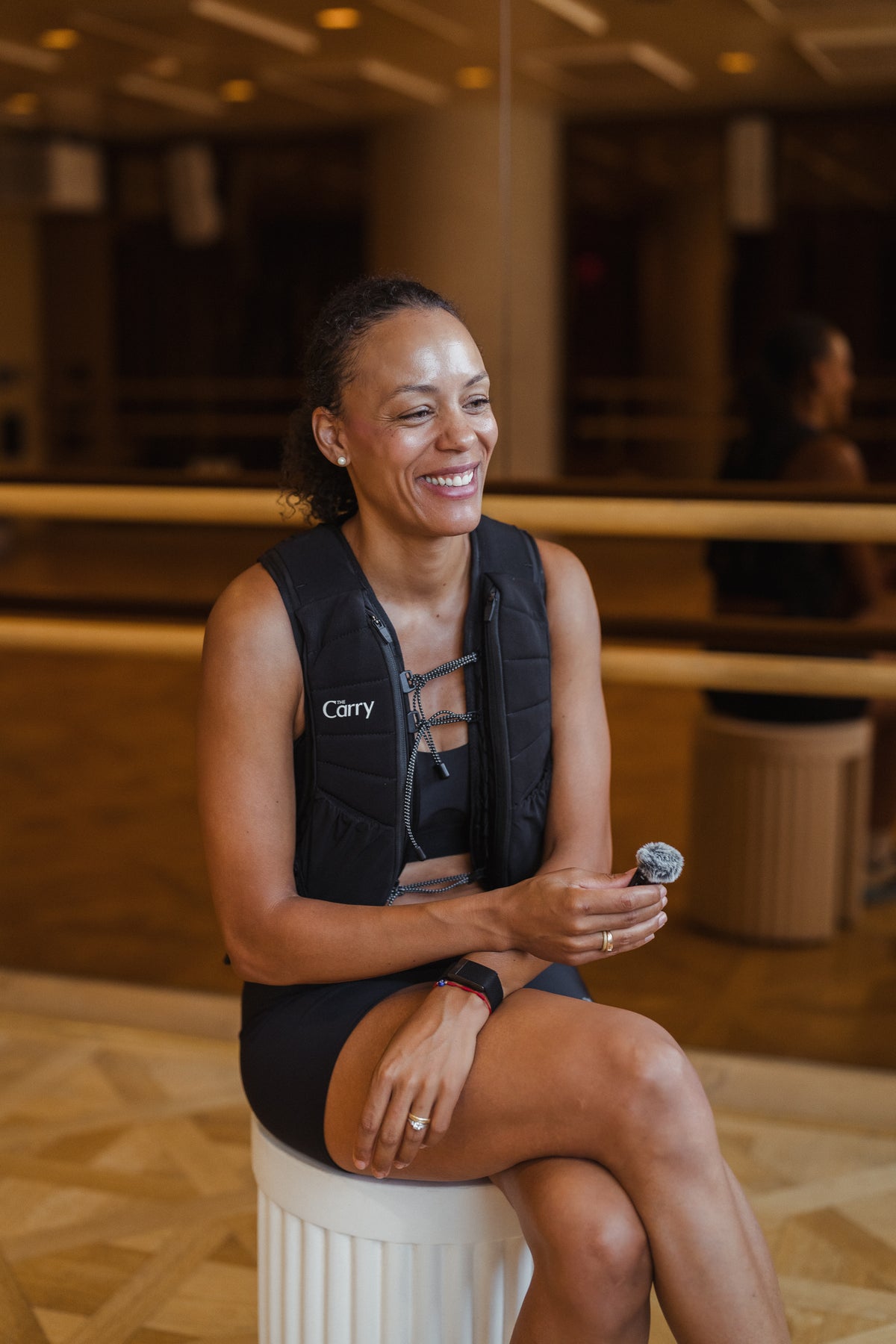 Roma van der Walt, MSc, wearing The Carry Weighted Vest