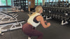 Demonstrating weighted workouts: weighted squat jumps in The Carry weighted vest