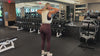 Demonstrating weighted workouts: weighted good mornings in The Carry weighted vest