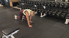 Demonstrating weighted workouts: weighted bear crawls in The Carry weighted vest