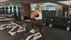 Demonstrating weighted workouts: weighted step ups + lift in The Carry weighted vest